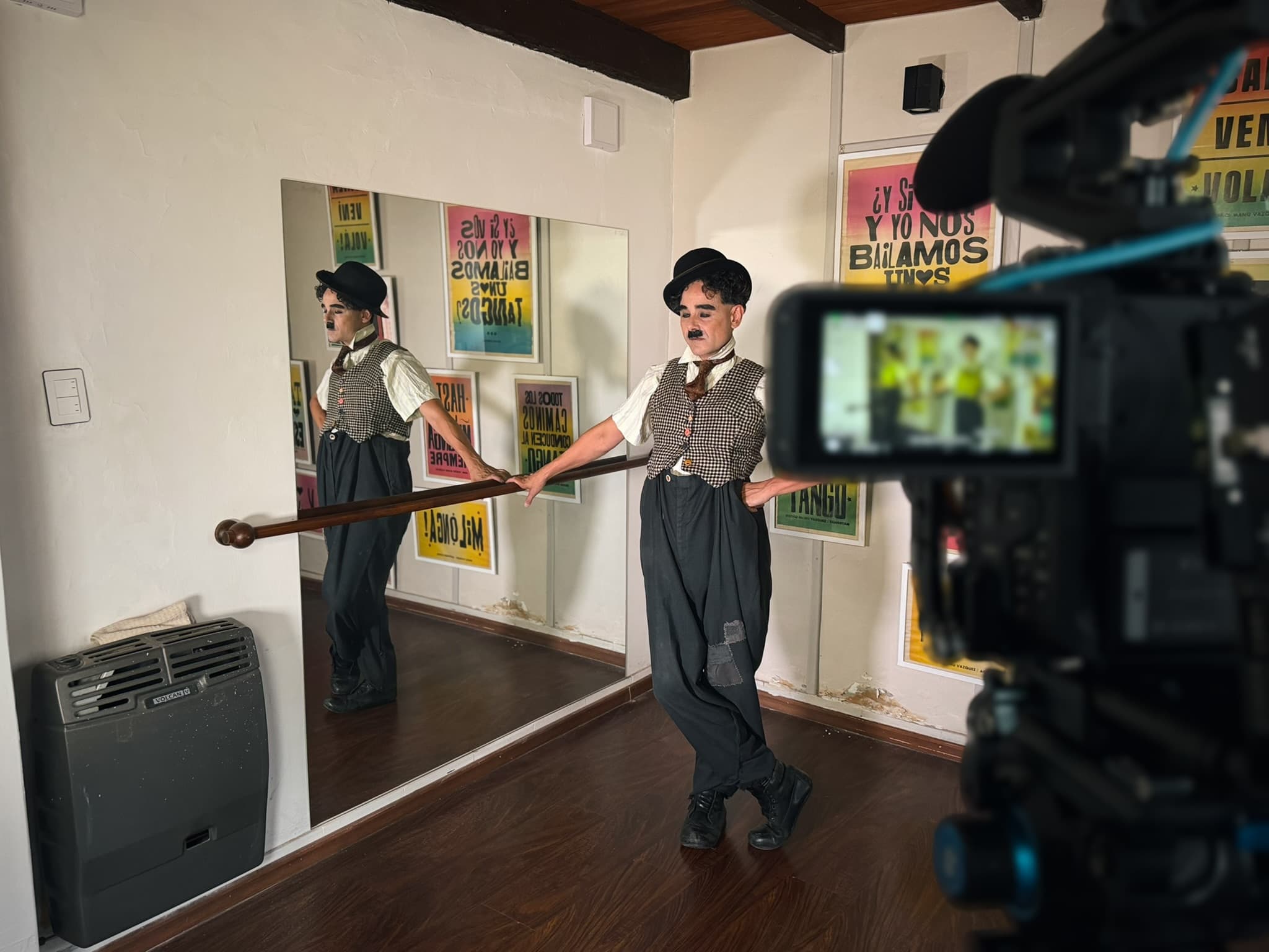 Charlie Chaplin character being filmed in studio