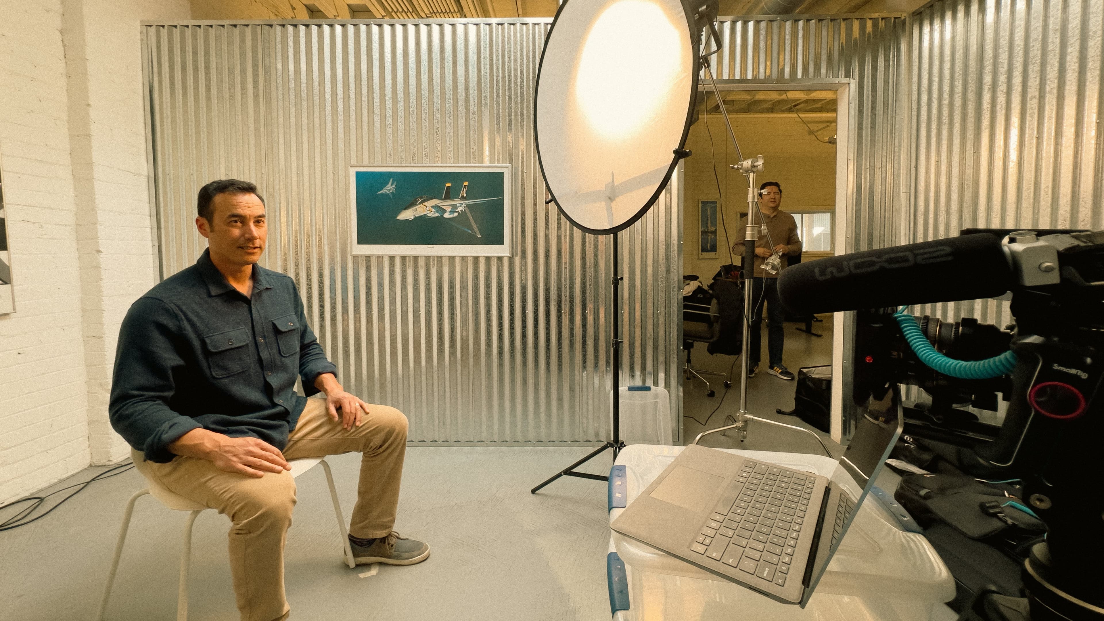 Professional video interview setup with lighting and camera equipment