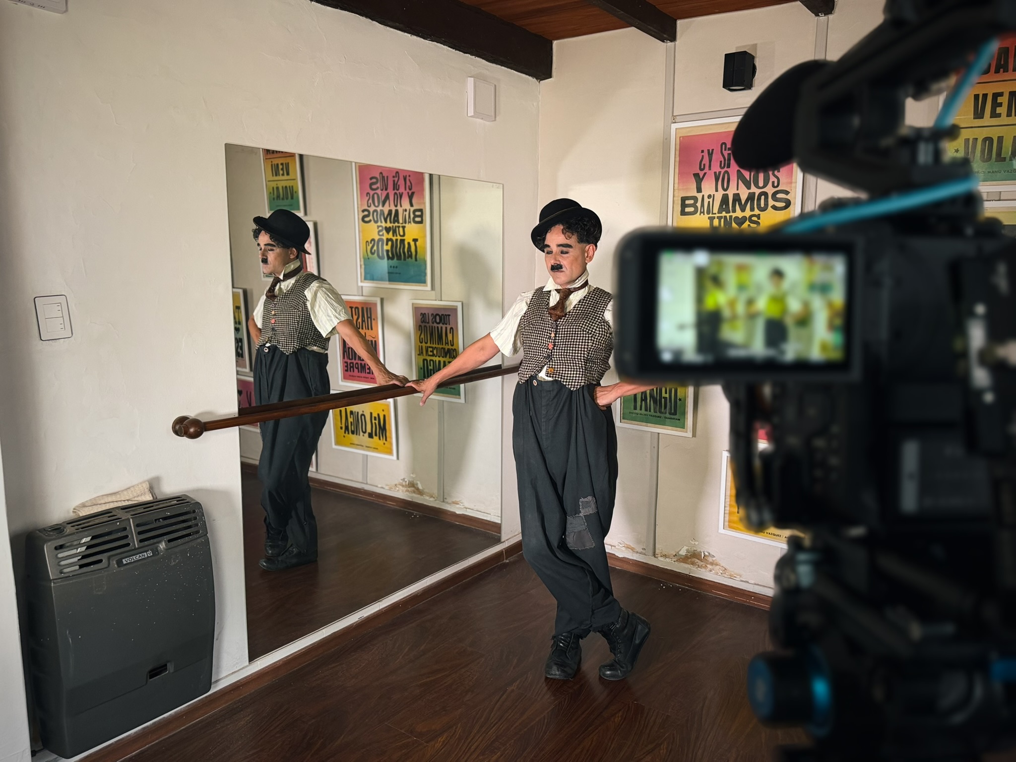 Charlie Chaplin character being filmed in studio
